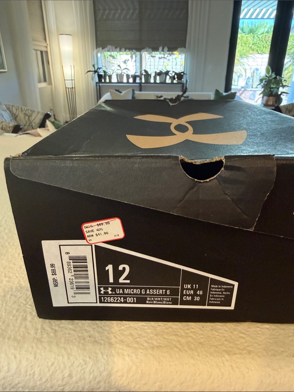 Under Armour Men’s Micro G Assert 6 athletic sneakers
